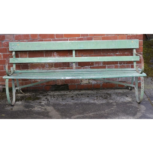 13 - Two similar wooden and iron Garden Seats. (2)