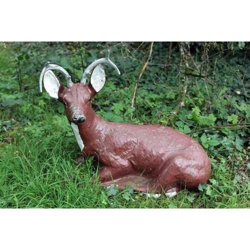 23 - A composition and painted Model of a resting Deer. (1)