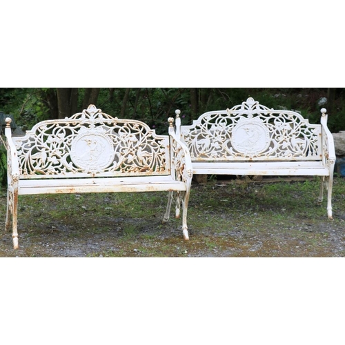 30 - A pair of attractive Victorian style Garden Seats, each with pierced decorated backs with medallion ... 