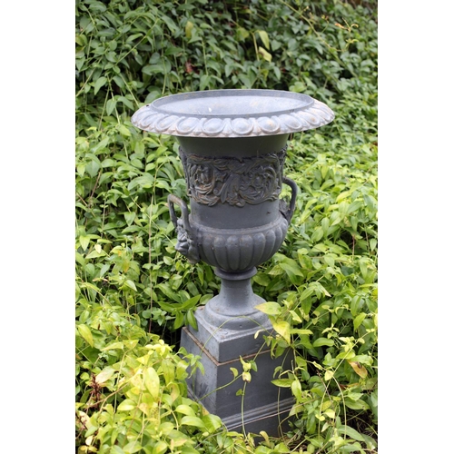 39 - A good pair of cast iron Victorian style two handled Urns, with egg n' dart moulded rims over decora... 