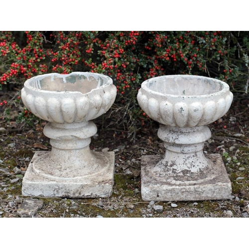 41 - A pair of terracotta Plant Pots, together with two metal Plant Trainers. (4)