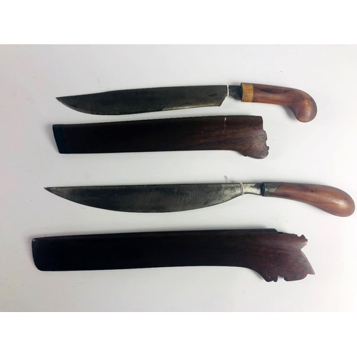 22 - Two similar Kurkha type Middle Eastern wooden handle Daggers, with scabbards. (2)
