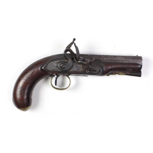 32 - An early 19th Century flintlock Pistol, by Tomlinson of Dublin, with damascus octagonal barrel, wood... 