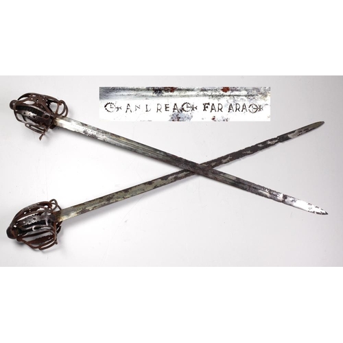 37 - A rare almost matching pair of 17th Century Italian basket hilted Broadswords, with c. 33 1/2