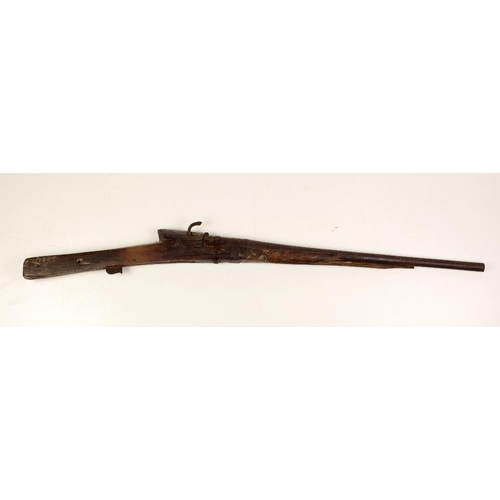57 - An antique Wheellock Rifle, dam; remains of a Flintlock Rifle, the stock and barrels of a double bar... 