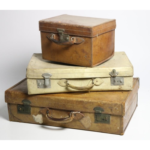 26 - A collection of varied old leather and vellum Travel Cases, a rectangular steel bound Trunk, etc. As... 
