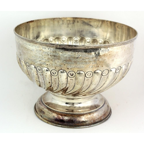 55 - A very large silver Punch Bowl, with reeded swirl body, a tall circular foot, Birmingham c. 1906, by... 