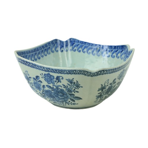 26 - A Chinese blue and white Nankin Bowl, of square form with re-entrant corners, decorated with floral ... 