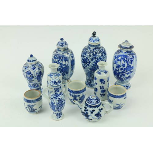 21 - A selection of six blue and white miniature Vases, (four with covers); a miniature blue and white Ew... 