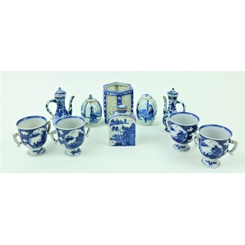 8 - A set of four two handled blue and white Chinese porcelain Cups, each on stemmed base, 10cms (4