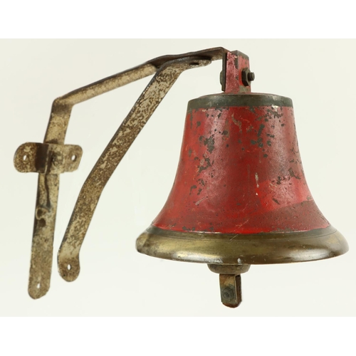 687 - World War 2 [The Emergency]  A mid 20th Century brass Bell (painted red) with original wall mou... 