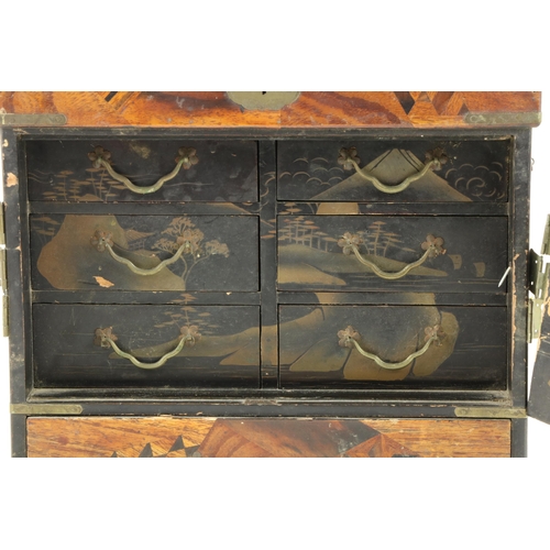 19 - A small 19th Century Japanese lacquer and specimen wooden Table Cabinet, with plated mounts; a rosew... 
