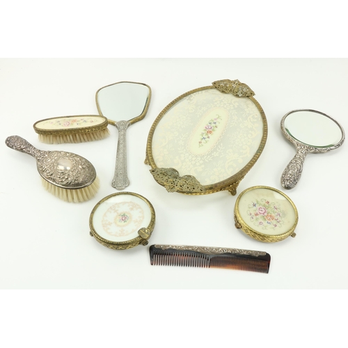20 - A three piece silver mounted Dressing Table Set, to include mirror, brush and comb; together with a ... 