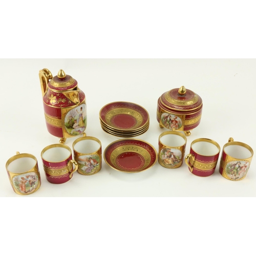31 - A small Vienna Coffee Set, with attractive gilt decoration on a red ground, coffee pot and cover, su... 