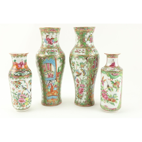 37 - A pair of Cantonese porcelain Vases, decorated with figures, flowers, birds, etc., 29cms (11 1/2