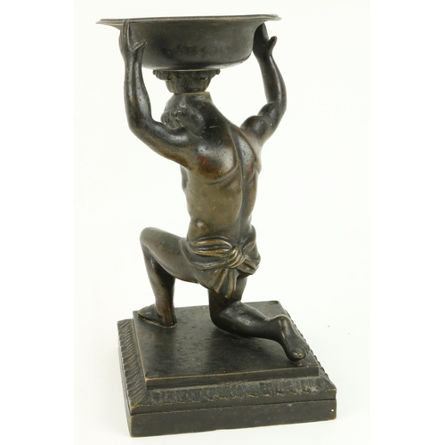 57 - A heavy 19th Century bronze Figure of Atlas, 22cms (8 1/2