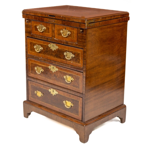 10 - A George III style mahogany Bachelors Chest, with crossbanded lift top over two short and three long... 