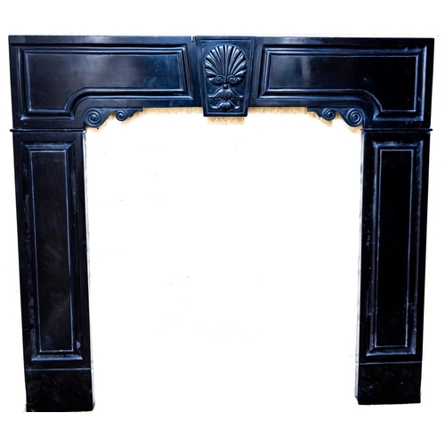 53 - A rare early Irish Kilkenny black marble Chimneypiece, George I, the shaped and moulded frieze with ... 