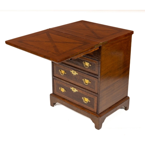 10 - A George III style mahogany Bachelors Chest, with crossbanded lift top over two short and three long... 