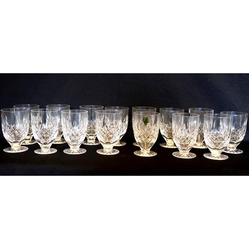 13 - A set of eighteen Waterford crystal water glasses, height 10 cms.