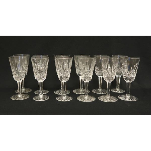 32 - A set of twelve Waterford crystal 'sherry' glasses, height 13 cms.