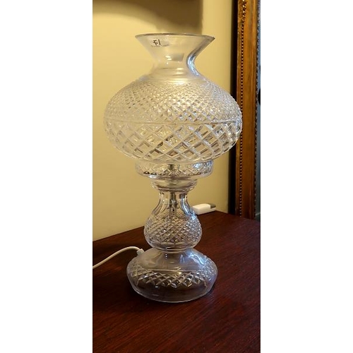 43 - A Waterford crystal table lamp and shade, height 48 cms.