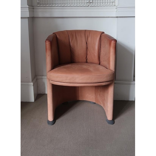 56 - A Rolf Benz leather tub chair, 75 cms high.
