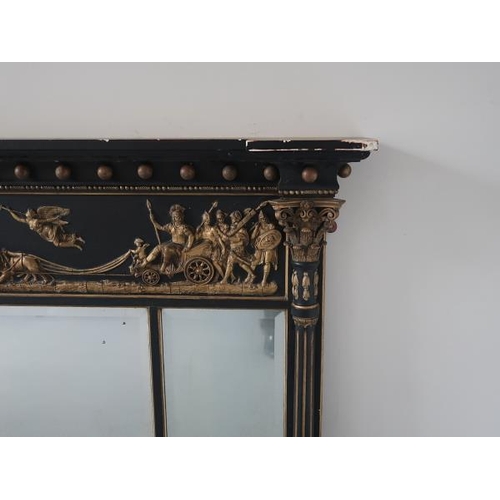 60 - A Victorian ebonised and gilded compartmented mirror, the frieze decorated with chariot and godesses... 