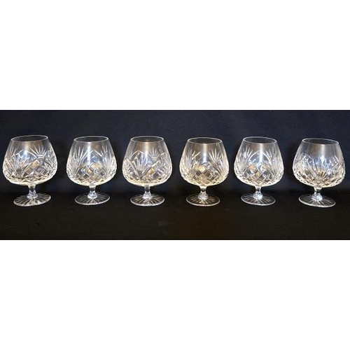 8 - A set of twelve Waterford crystal brandy glasses, height 13 cms.
