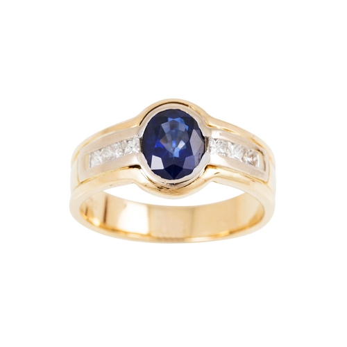 A SAPPHIRE AND DIAMOND DRESS RING, the oval sapphire to channel set