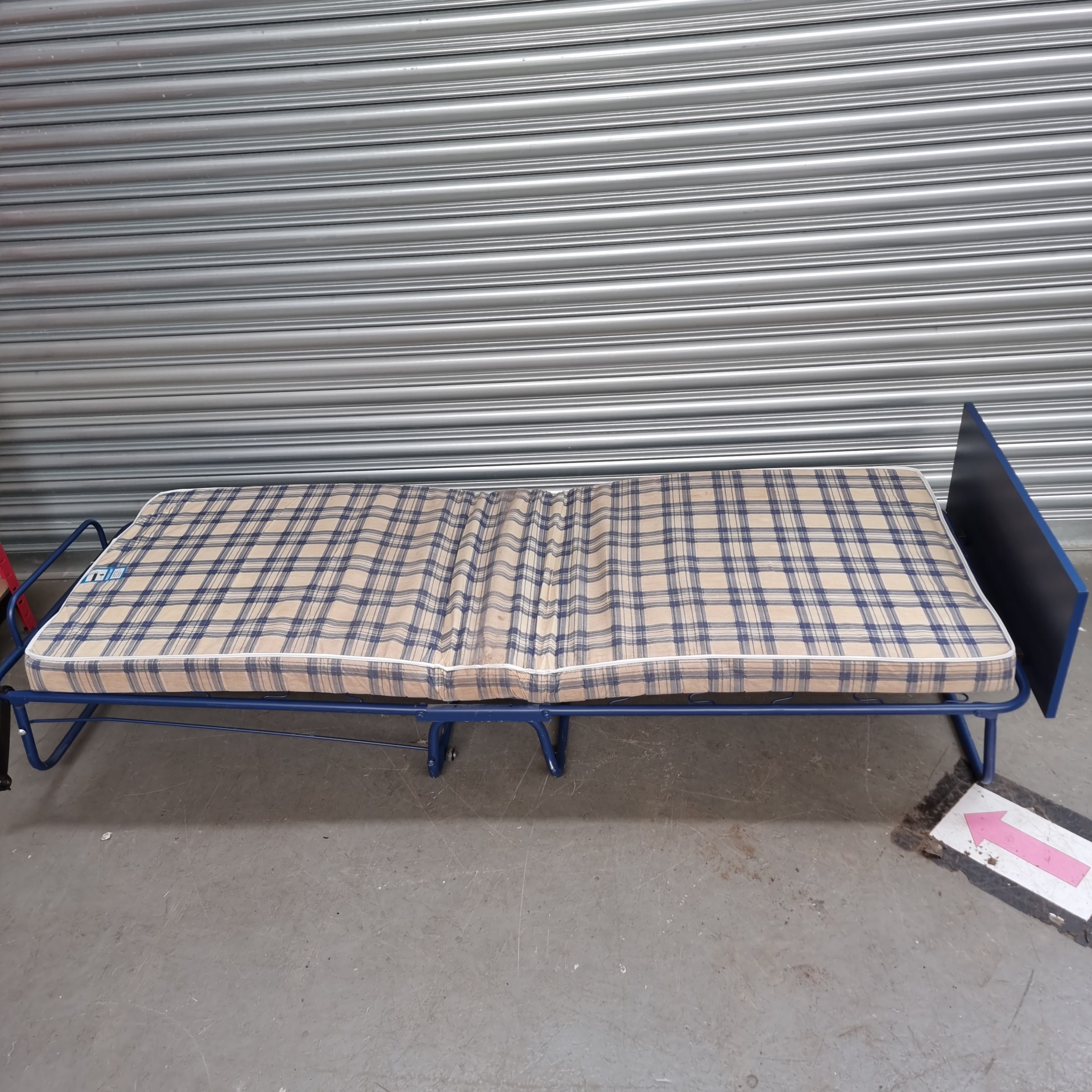 Fold up camping bed.