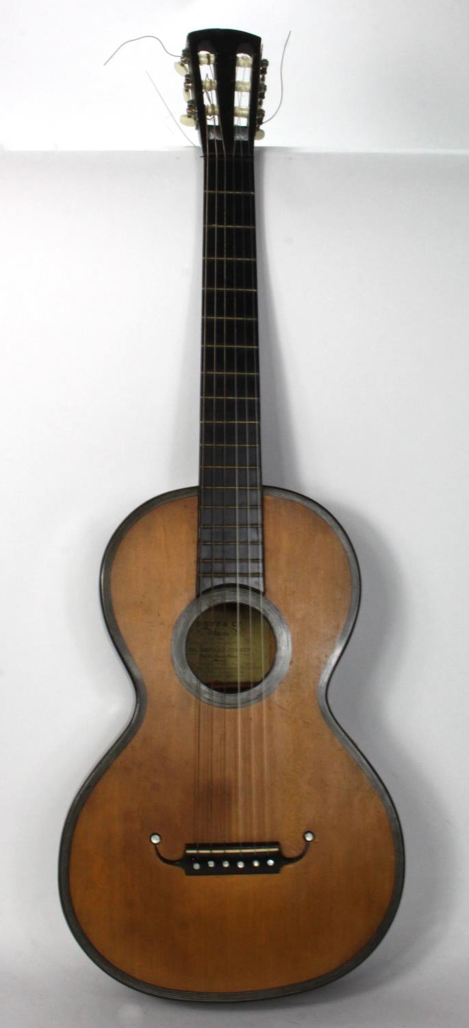 Acoustic Guitar. Late Victorian/ Early 20th century acoustic guitar in wooden coffin shaped carry ca