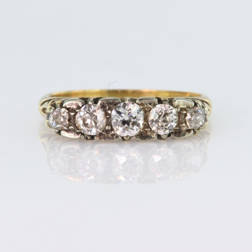 14 - 18ct yellow gold carved head ring set with five graduated old cut diamonds, centre diamond approx. 0... 