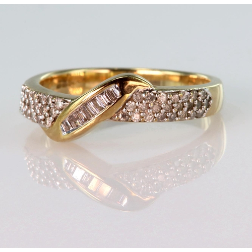 20 - 9ct yellow gold band ring set with seven baguette cut diamonds in a diagonal channel setting, with p... 