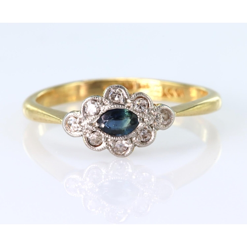 22 - 18ct yellow gold and platinum ring set with a central oval sapphire surrounded by eight round brilli... 