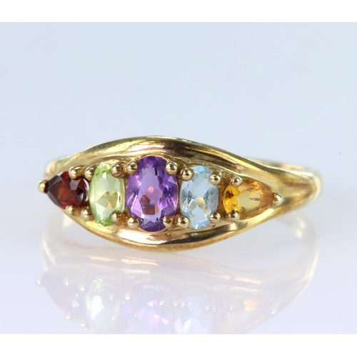 44 - 9ct yellow gold multi gemstone dress ring with a central oval amethyst measuring approx. 6mm x 4mm, ... 