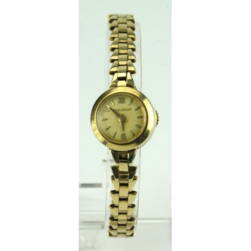 517 - Ladies 9ct cased Jaeger-Le-Coultre  wristwatch on a 9ct bracelet, working when catalogued. Total wei... 