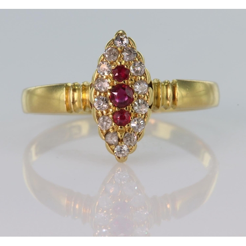 7 - 18ct yellow gold marquise shaped ring set with three graduated rubies surrounded by fourteen round o... 