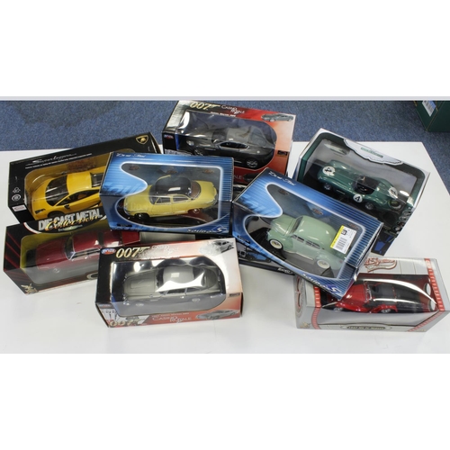 42 - Diecast Models. A collection of eleven boxed mostly 1:18 scale model cars, makers include Ricko, Sol... 