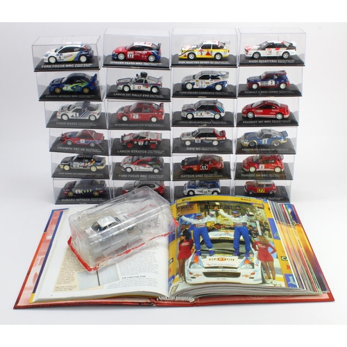 52 - Diecast. Twenty four cased diecast rally cars by De Agostini, together with a folder of related maga... 