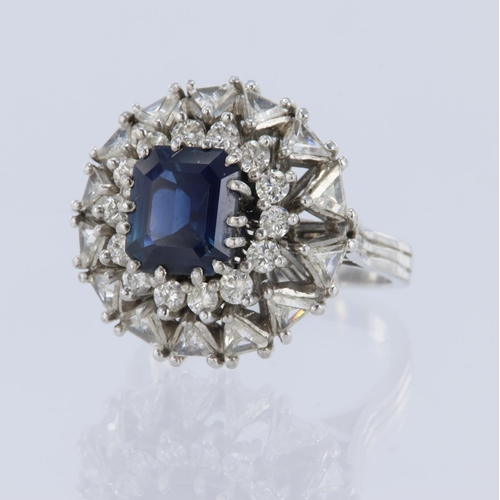 1 - White metal tests 18ct sapphire and diamond double cluster ring, emerald-cut sapphire weight approx ... 