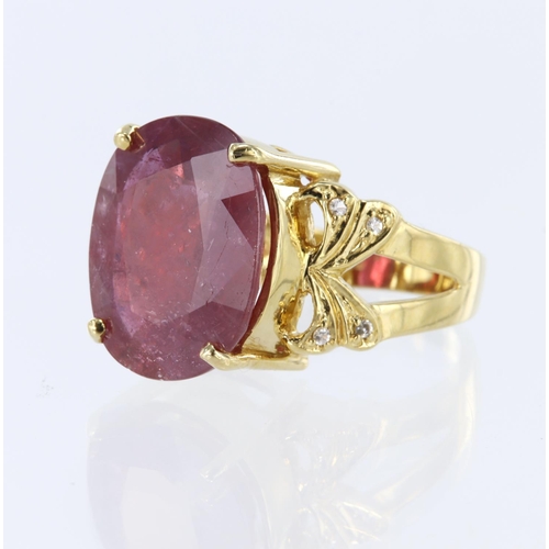 13 - 18ct yellow gold dress ring set with an oval glass filled ruby measuring approx. 17mm x 15mm, with b... 