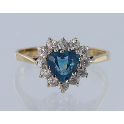 16 - 9ct yellow gold, cluster ring, heart shaped Swiss blue topaz measuring approx 12mm x 6mm, set with 1... 