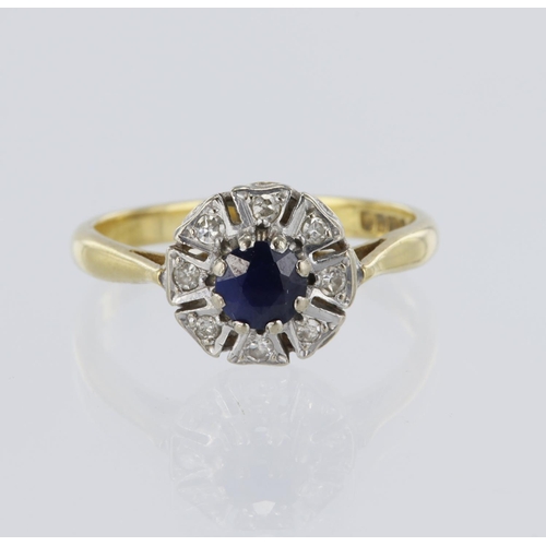17 - 18ct yellow gold cluster ring, set with a sapphire, diameter measuring 4mm, surrounded by 8 diamonds... 