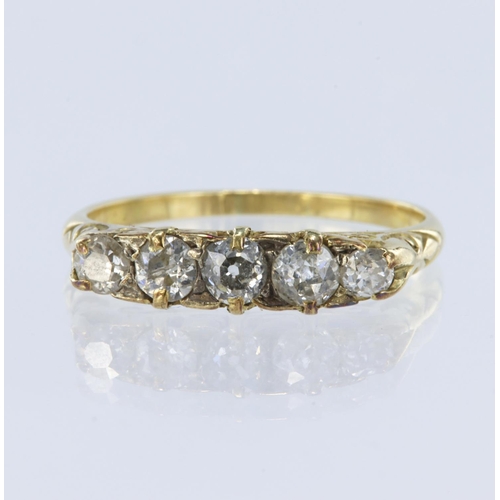 28 - Yellow metal tests 18ct diamond boat shaped ring, set with five old cut diamonds total weight approx... 