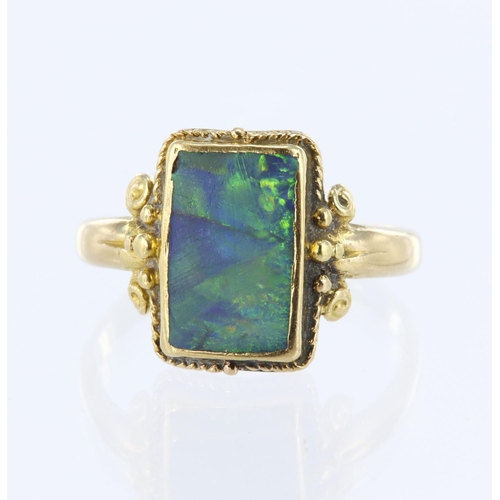 48 - 14ct yellow gold ring with rectangular opal measuring approx. 12mm x 8mm (some cracking) set in a cl... 