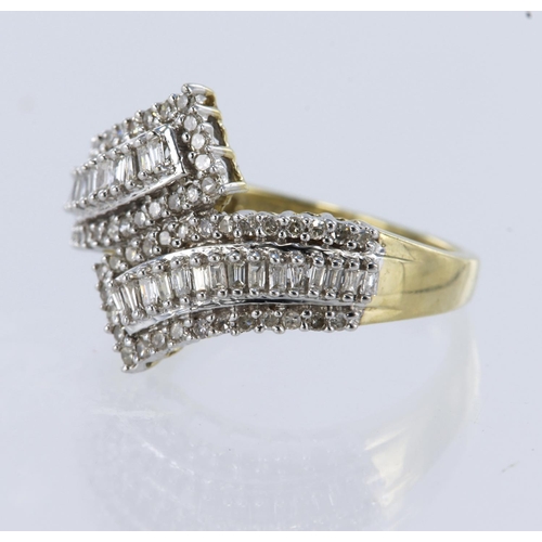 54 - 9ct yellow and white gold crossover style ring set with thirty baguette cut diamonds and fifty five ... 