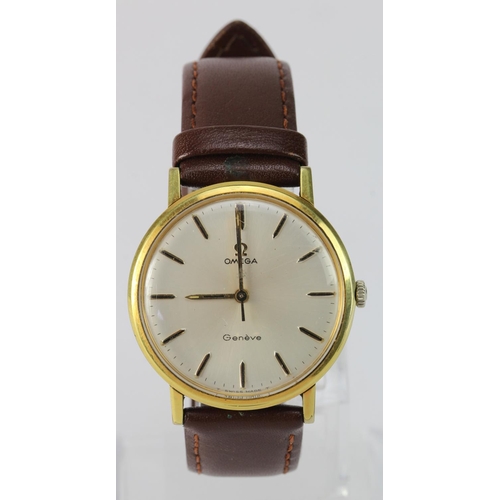548 - Gents gold plated Omega Geneve manual wind wristwatch. The cream dial with gilt baton markers. Watch... 