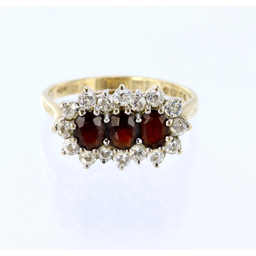 57 - 9ct yellow gold triple cluster set with garnets and cz, finger size Q/R, weight 3.4g