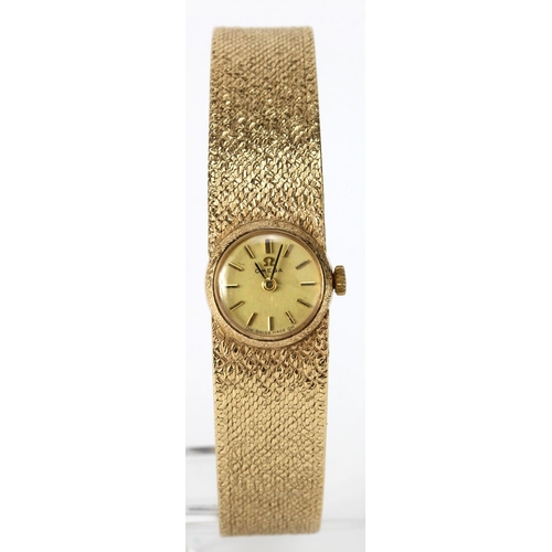 598 - Ladies 9ct cased Omega wristwatch (hallmarked 1969) on a 9ct integral Omega bracelet. Total weight 3... 